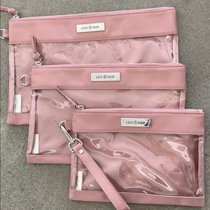 Lily Jade NWOT packing cases in mauve.